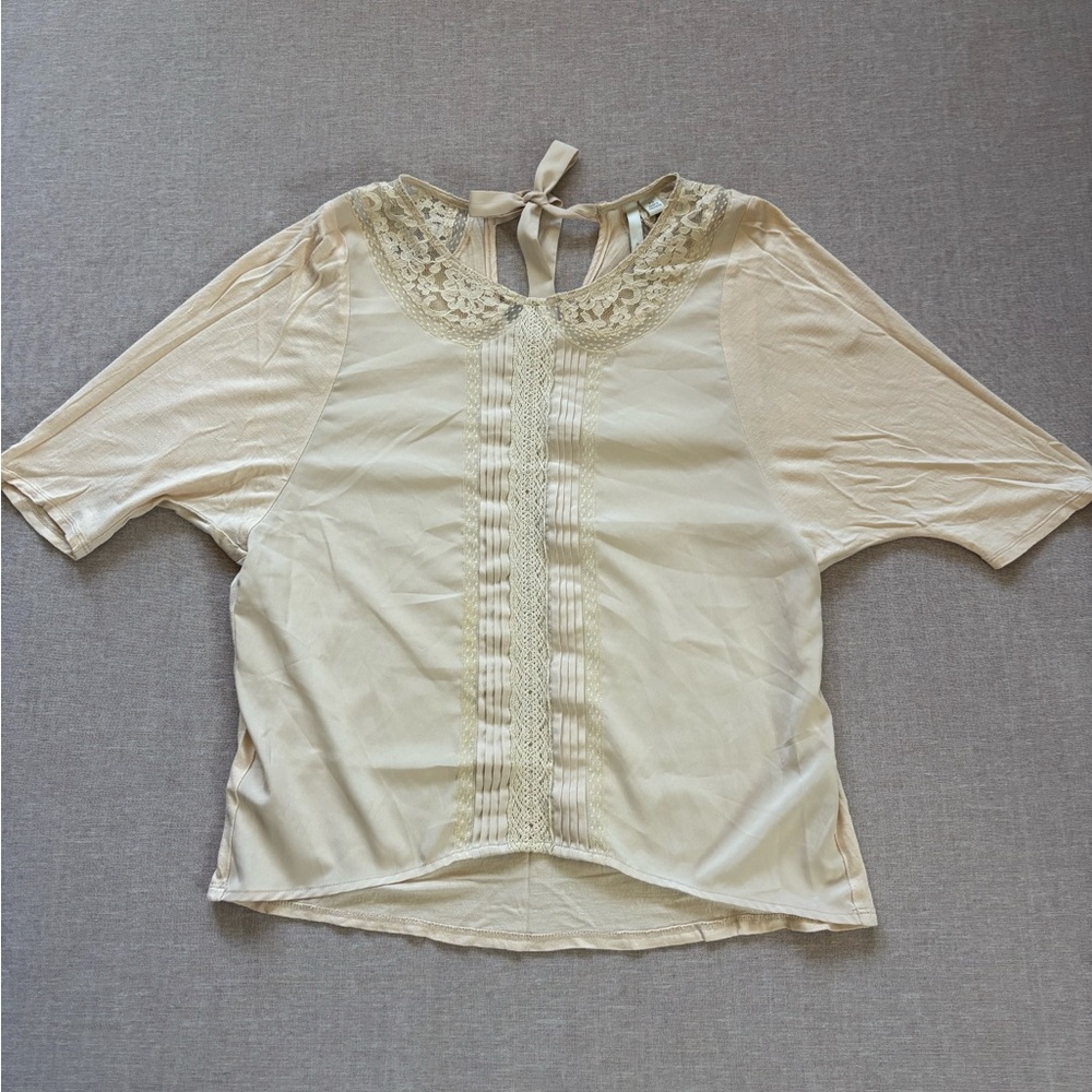 Lauren Conrad cream lace blouse.
